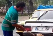 Köpeğe ‘kaşağı’…Temizlik personeli süpürgeyle sokak köpeğinin sırtını kaşıdı!