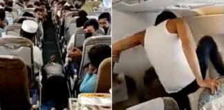 Kırmak için uçağın camını tekmeleyerek panik yarattı