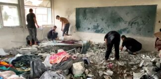 İsrail yine yerinden edilmişlerin barınağını vurdu; yine aynı gerekçeyi öne sürdü.