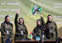 Gazze’de kurulu sahnede törenli rehine teslimi.